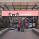 Hangzhou father and son in front of their convenience store.